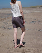 Back view of natural linen shorts