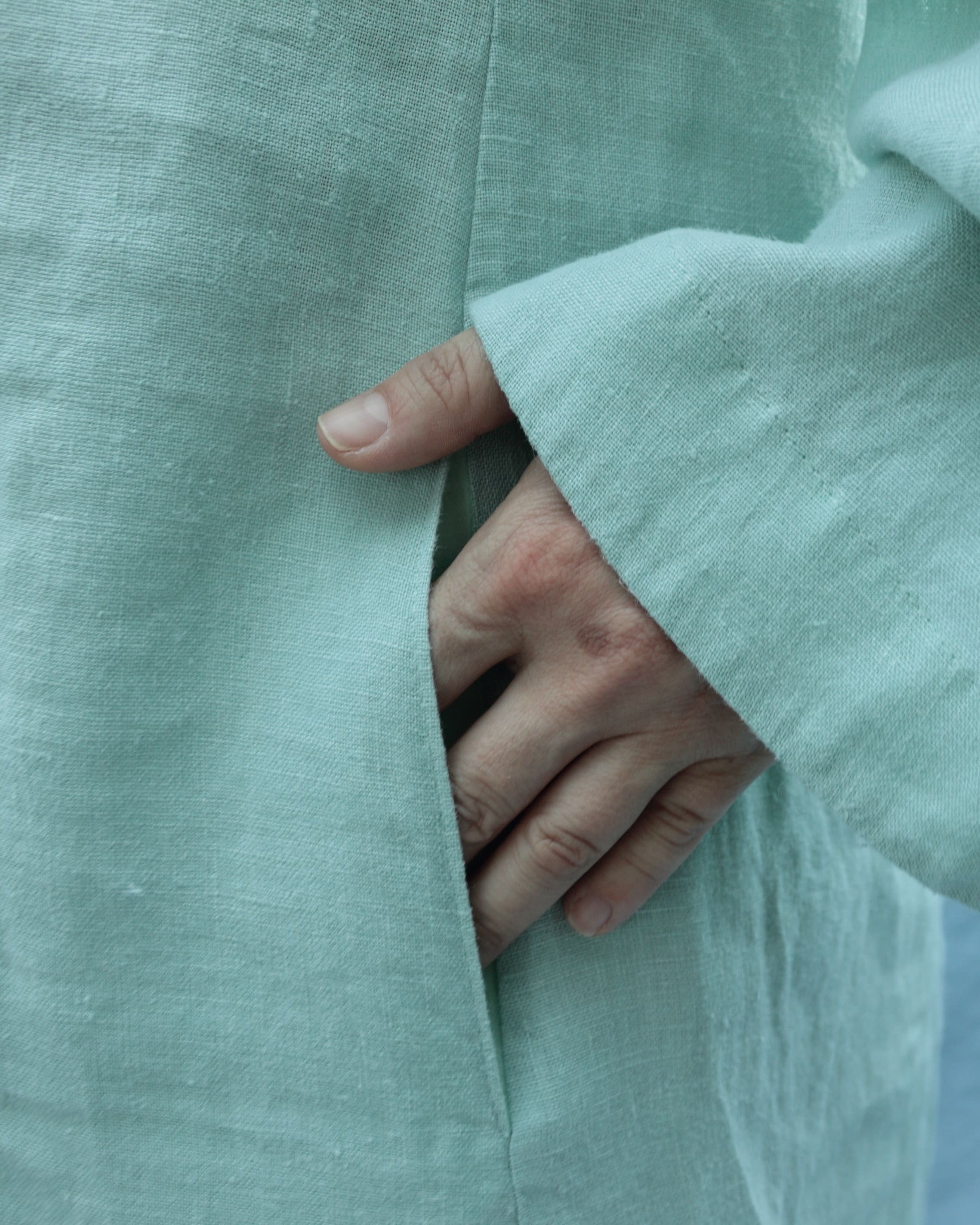 Long sleeve detail on meadow green linen dress