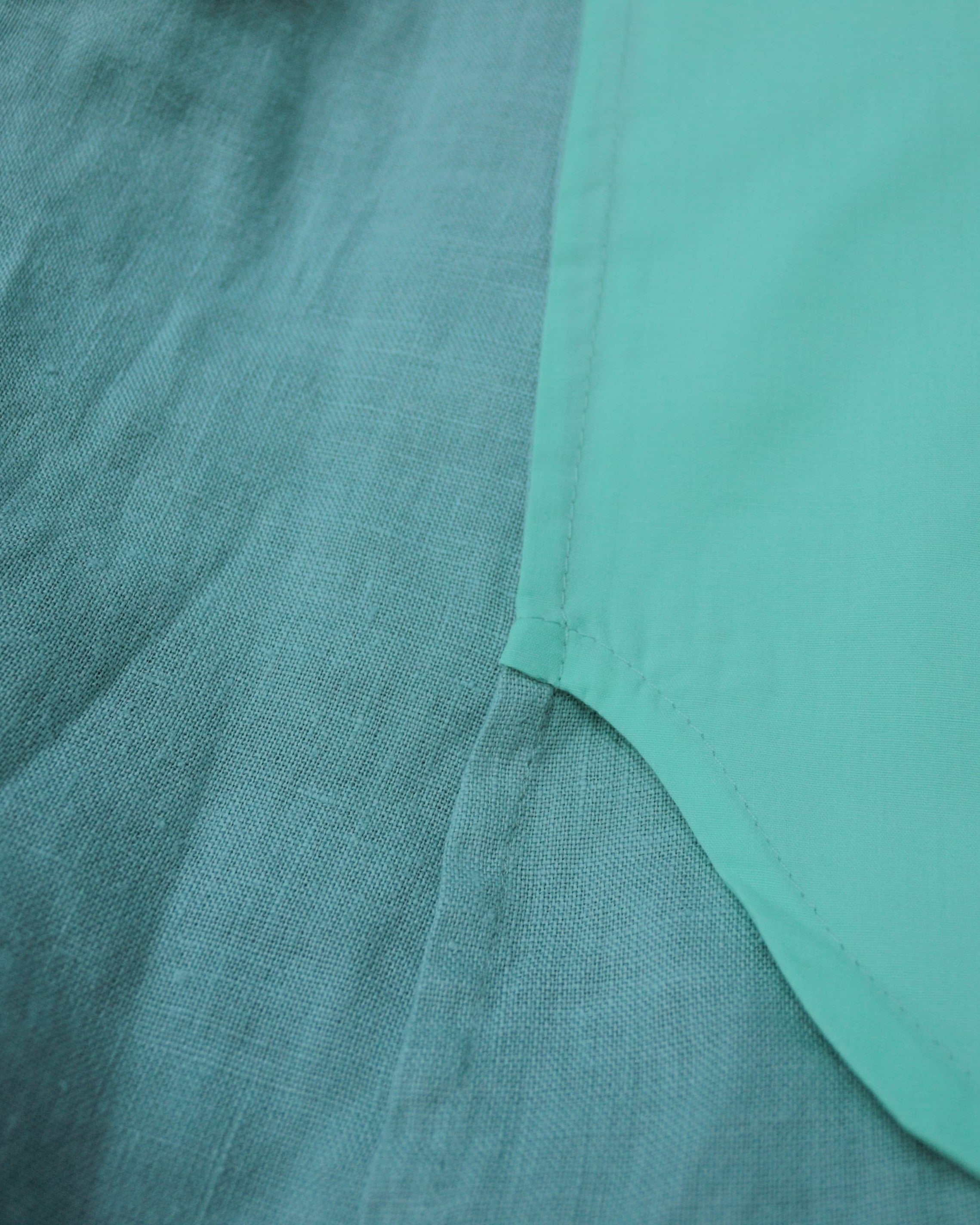Seams detail on meadow green linen dress